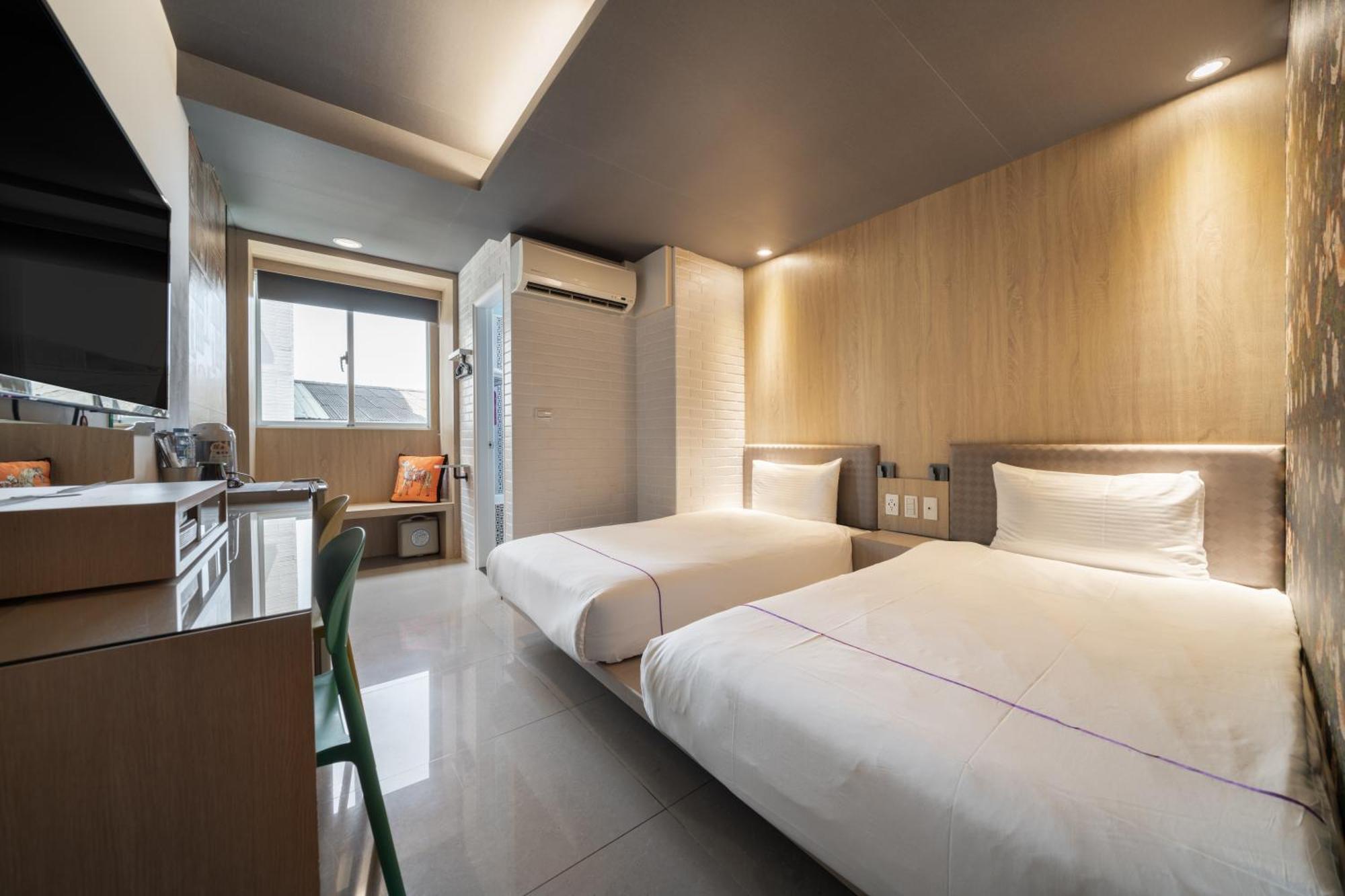 S&E Hotel Тайнан Екстериор снимка
